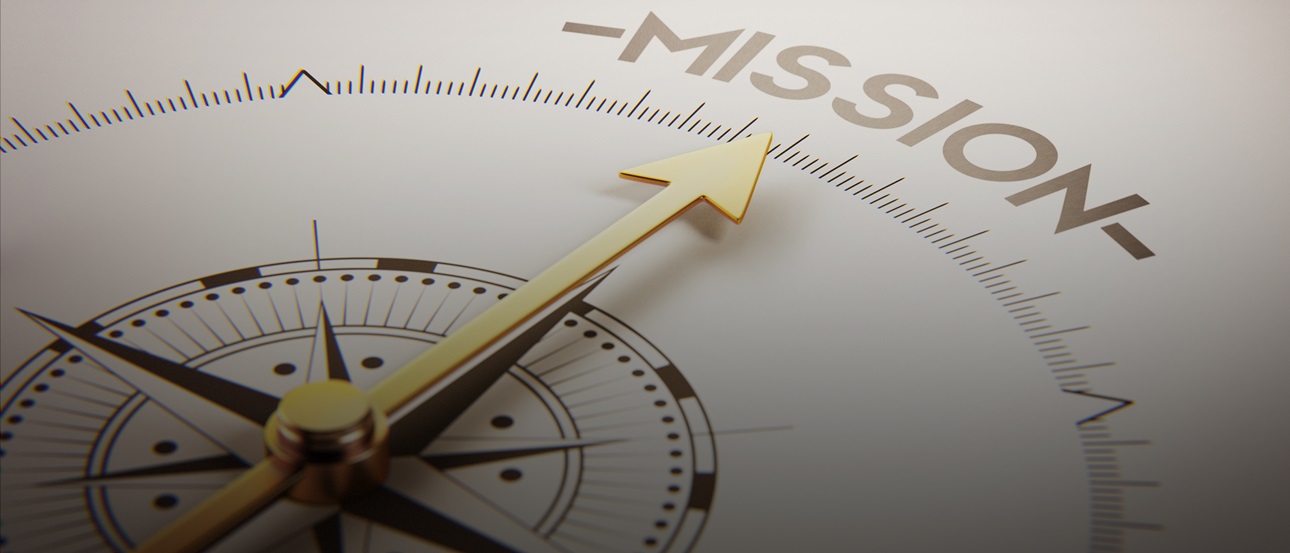 A compass arrow pointing to the word "Mission"
