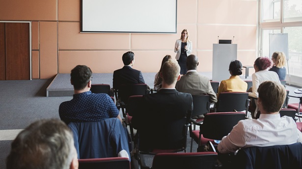 A presenter teaching a seminar